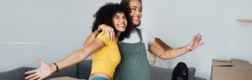 A couple celebrates their new home purchase