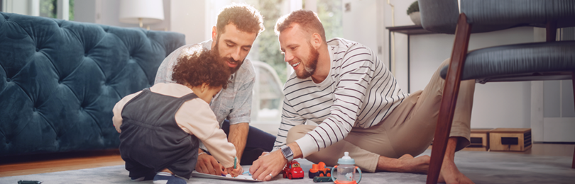 A couple plays a game with their child