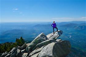 Hiker_On_Mountain_Top_With_View Hiker_On_Mountain_Top_With_View