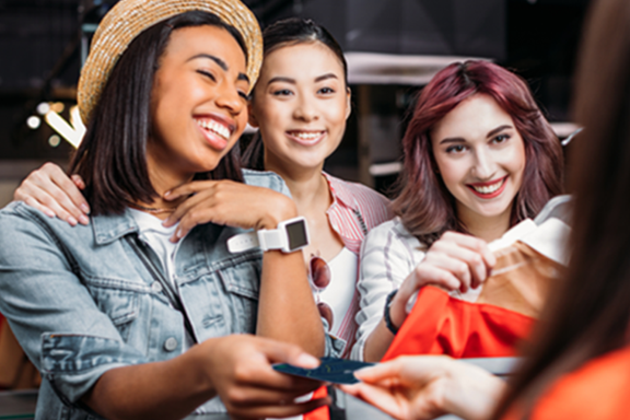 Young Women Purchasing